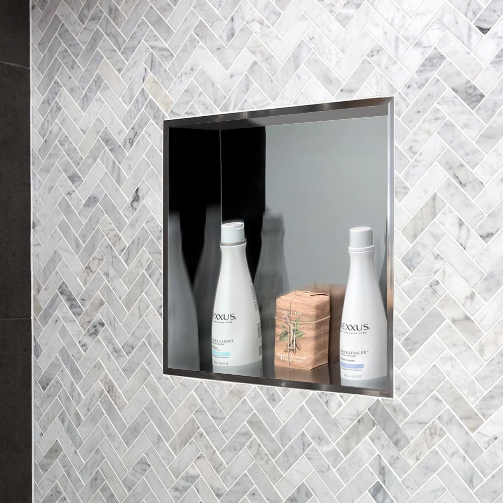 Shower niche with shampoo and conditioner.