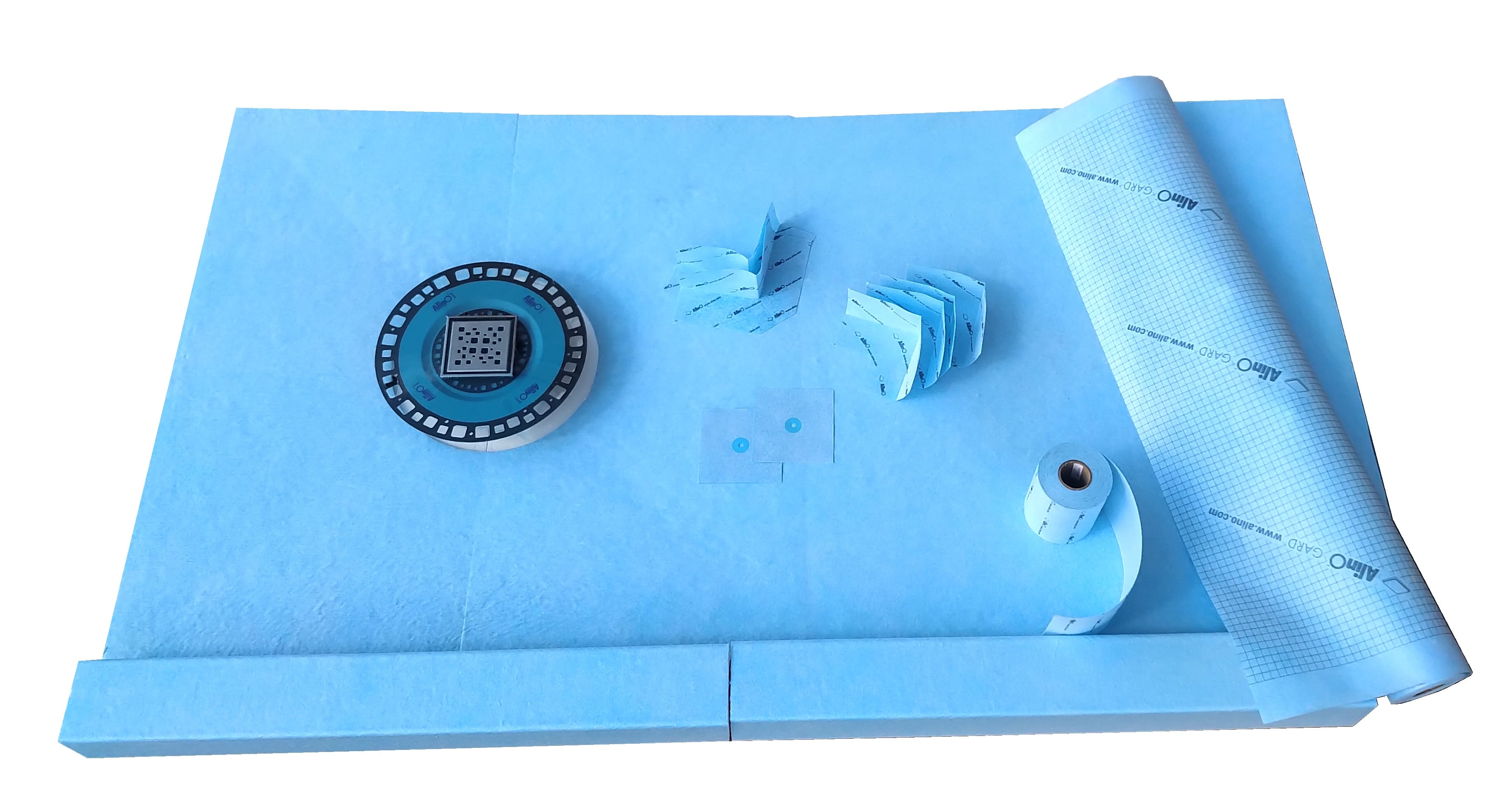 A blue tray with some papers and a clock