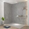 Modern walk-in shower with gray walls.