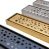 Here's an alt tag for the image: Stylish shower drains in various finishes.